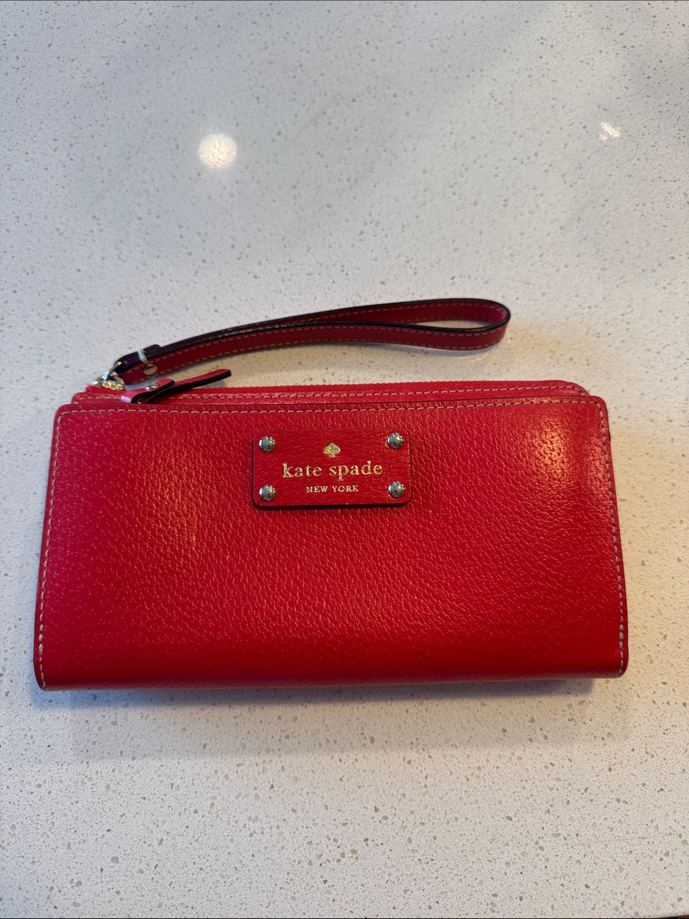 kate spade Red Pebbled Leather Wristlet Wallet with Logo Plaque